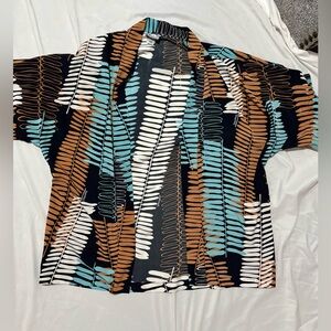 Manuhealii Tropical Leaf Print kimono in Black, white, Blue, and Tan